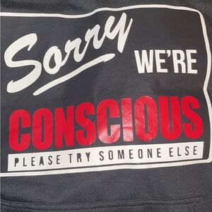 Sorry we’re conscious hoodie